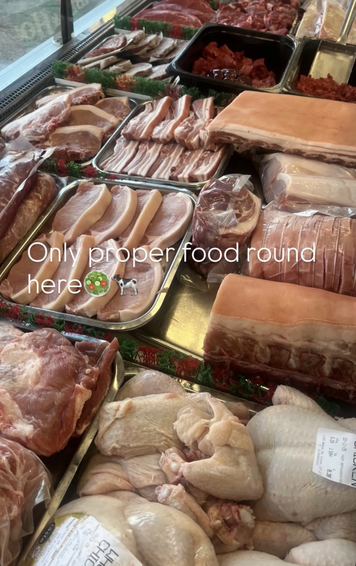 Butcher counter with fresh meat — 'Only proper food round here'